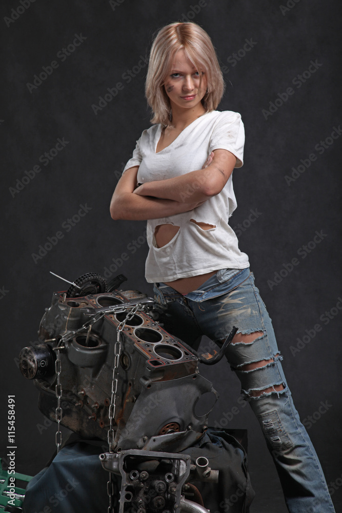 girl in engine oil with wrench key girl in engine oil with wrench key