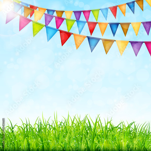 Greeting card with colorful flags and green grass