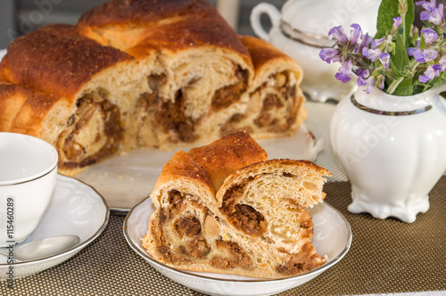 Big piece of traditional italian flavorous cake La Gubana.