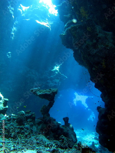 Light streaming into tunnels and caves at Paradise Reef  Red Sea