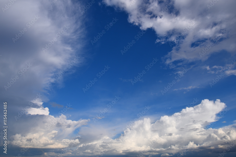 White clouds framing a blue sky White clouds framing a blue sky