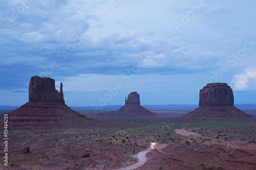 The West and East Mitten Buttes and Merrick s Butte at night in Monument Valley 