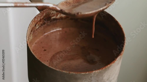 Making chocolate dough for brownie - stirring cocoa dough mixture