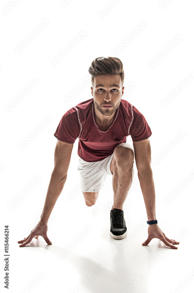 Strong young man ready to run Strong young man ready to run