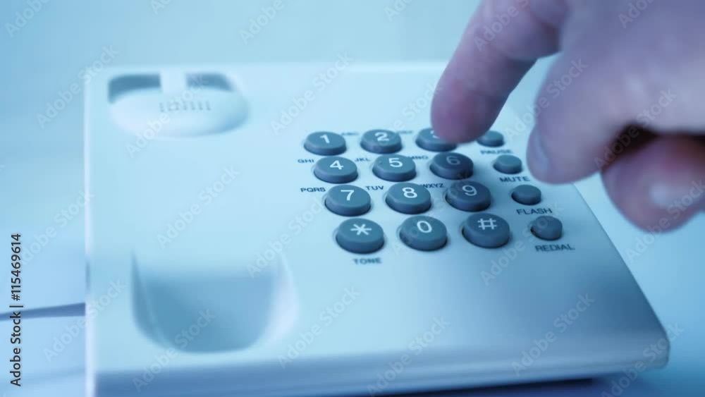 Hand picks up the phone, dials Emergency Number 911 Hand picks up the phone, dials Emergency Number 911