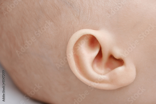 Ear of a little baby closeup