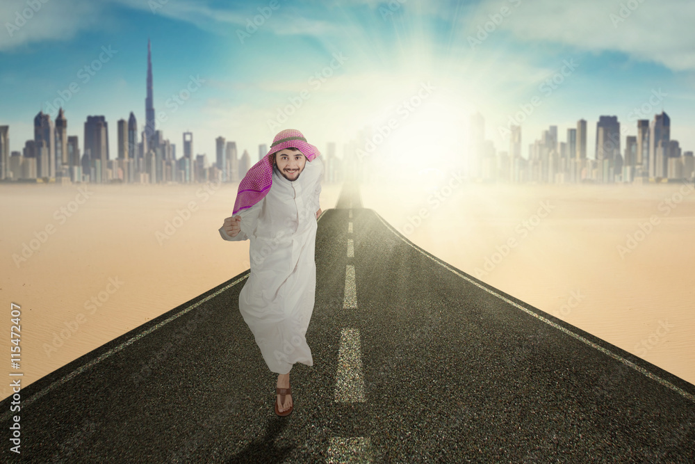 Arabic man running on the highway Arabic man running on the highway