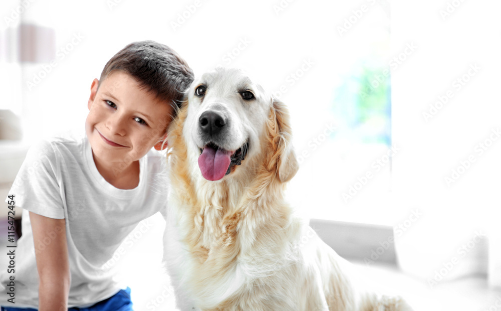 Small boy and cute dog at home Small boy and cute dog at home