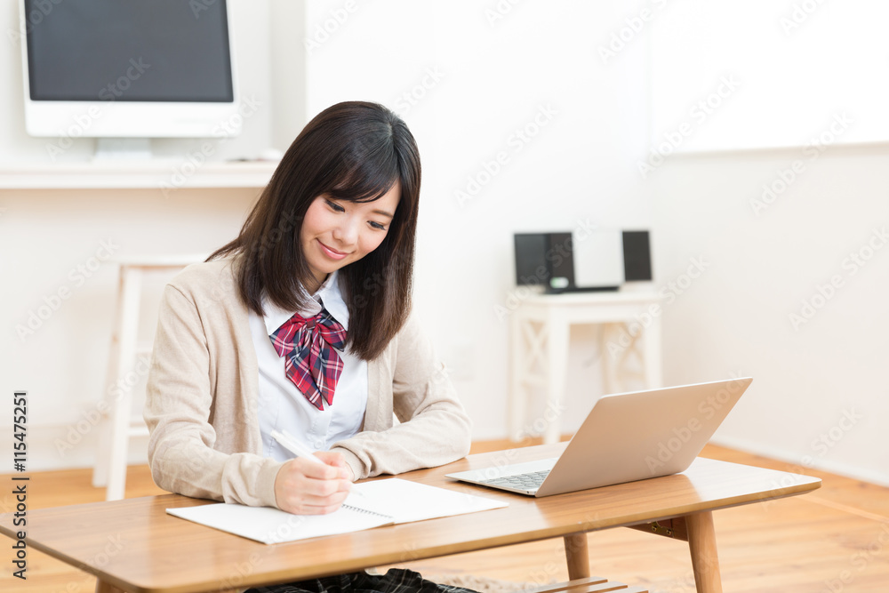 portrait of asian schoolgirl studying in the room portrait of asian schoolgirl studying in the room