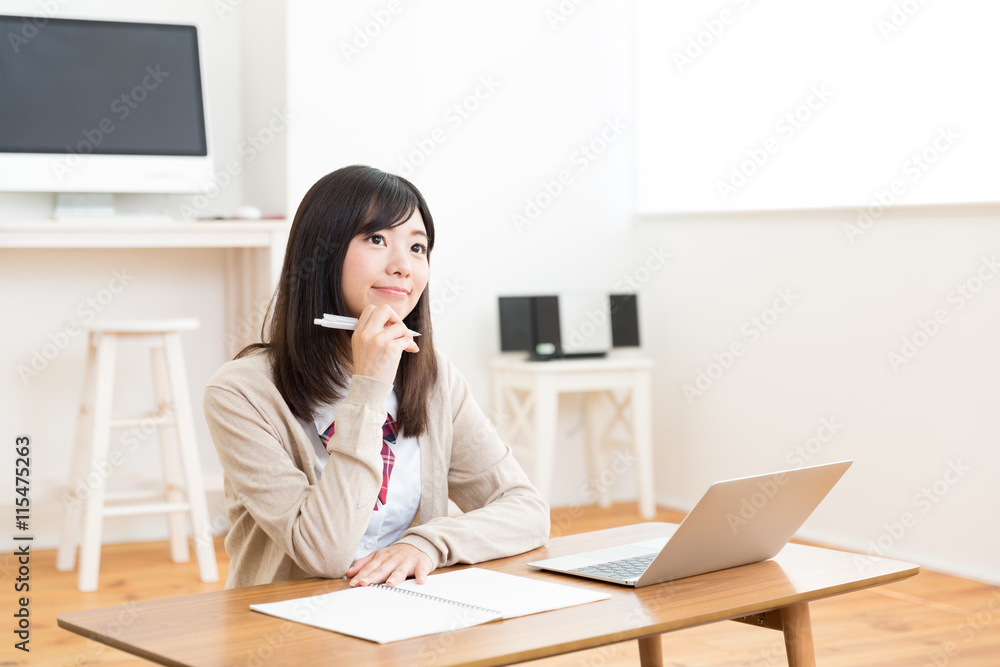 portrait of asian schoolgirl studying in the room portrait of asian schoolgirl studying in the room