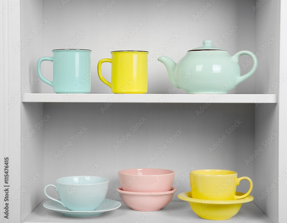 Dishes in cupboard in the kitchen Dishes in cupboard in the kitchen