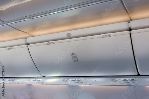 Overhead compartment in commercial aircraft.