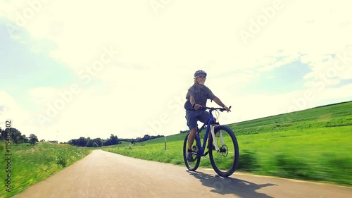 Senior man riding his mountain bike
