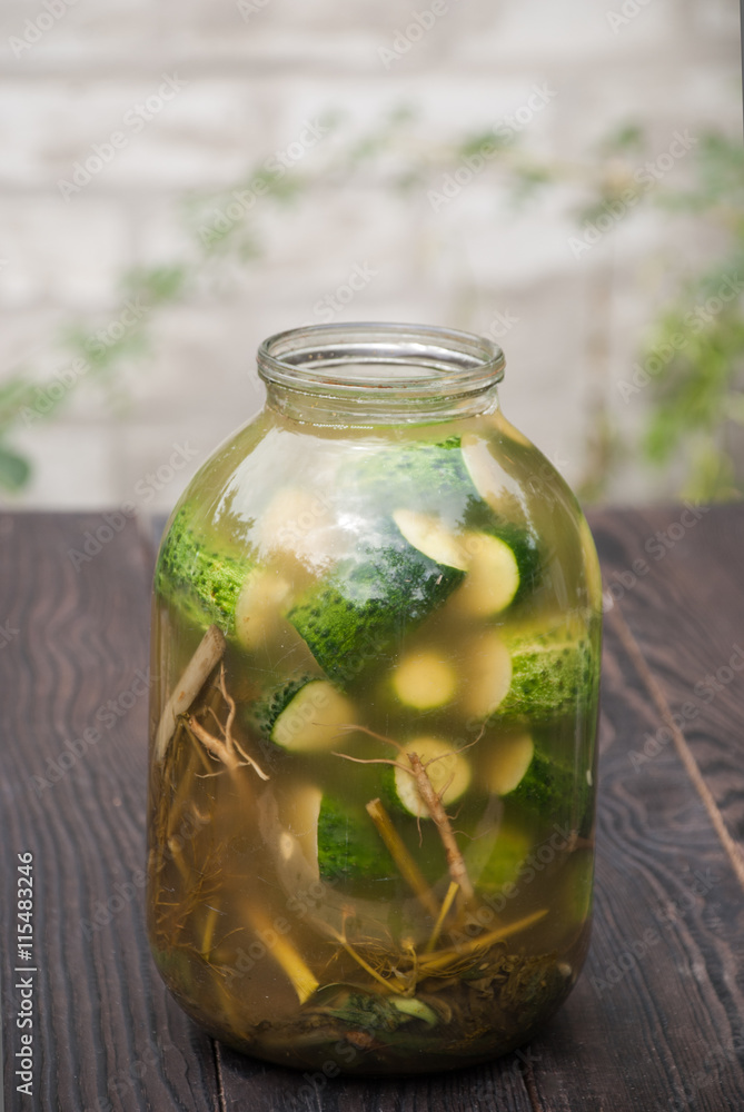 Large glass jar with homemade pickles Large glass jar with homemade pickles