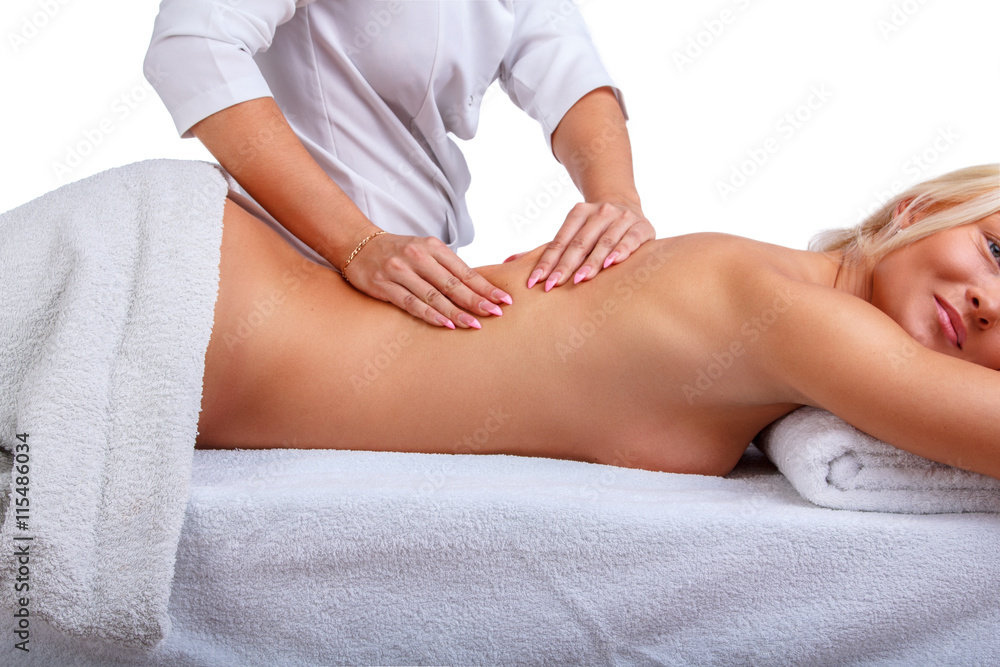 Female enjoing relaxing back massage.