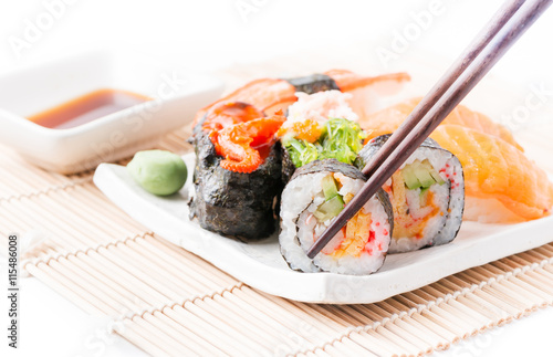 sushi on white dish isolated