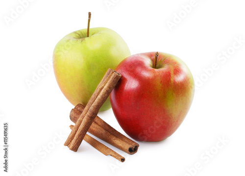 two apples and cinnamon isolated on white background