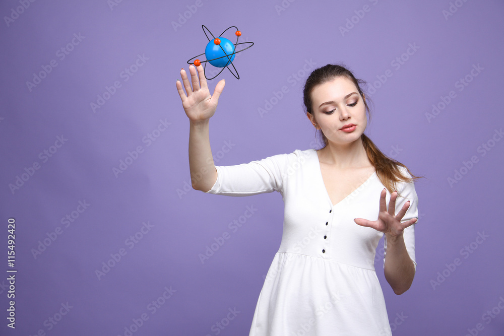Woman scientist with atom model, research concept Woman scientist with atom model, research concept