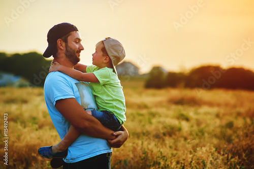 Happy family. Father and son playing and embracing the outdoors. Father's day