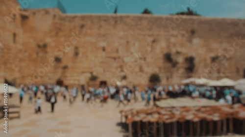 Jewish prayers at the Western wall in the old city of Jerusalem Israel - Blurred
