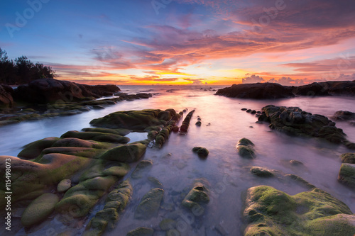 Long exposure sunset sesacape at Kudat Sabah Malaysia, image contain soft focus and blur. photo