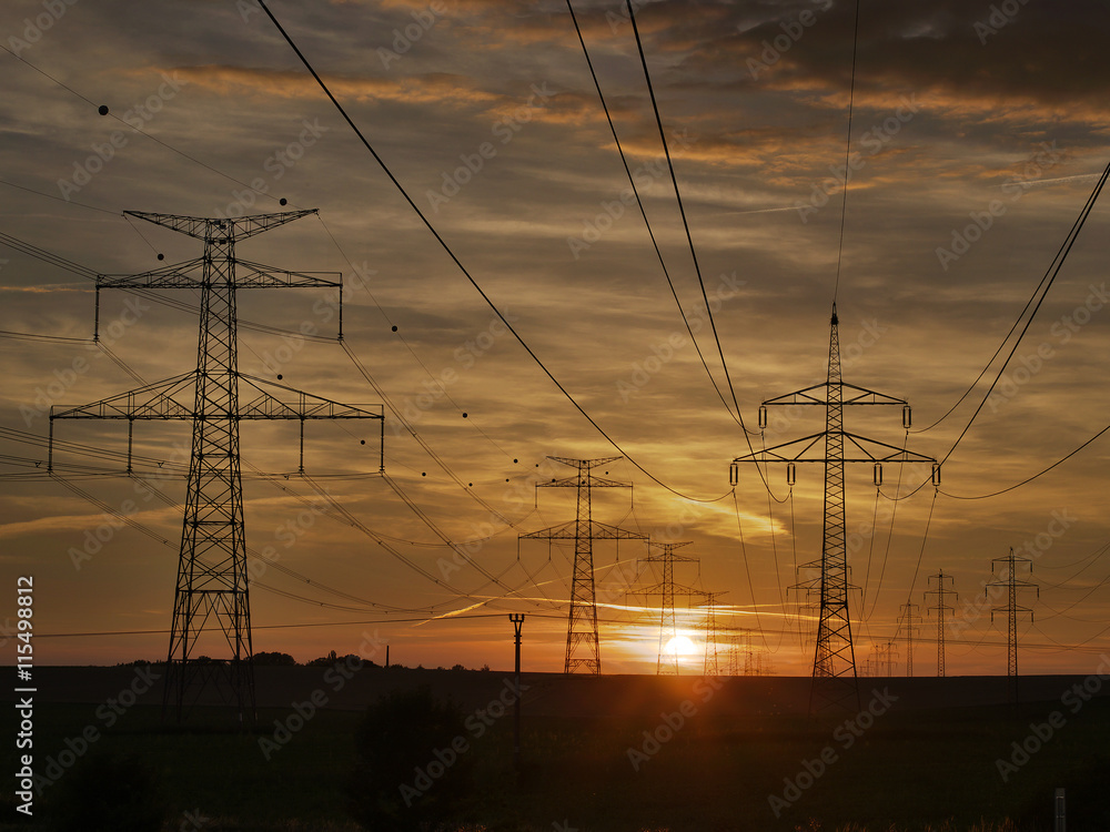 Sunset and electricity pylons near Svemyslice, Czech Republic, Europe
