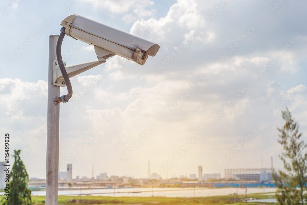 Security CCTV camera on road in city Security CCTV camera on road in city