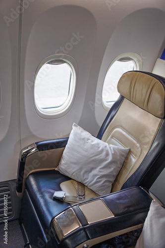business class seat in aircraft © romantiche
