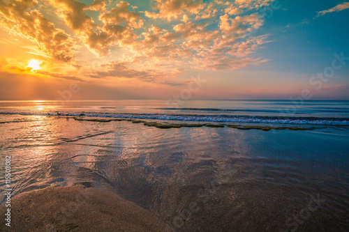Earle morning on the sea shore, sunrise photo