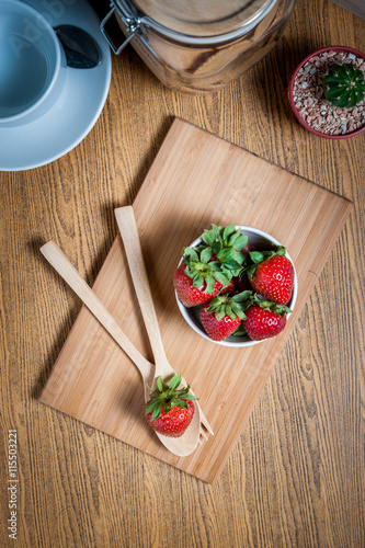 Fresh strawberry and juice on wood table. flat lay.