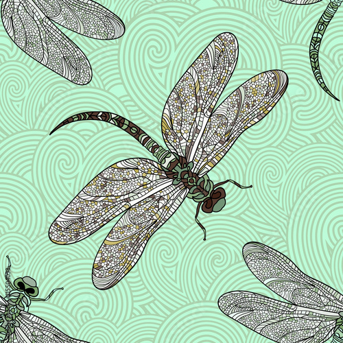 Seamless vector pattern with dragonfly on a green background.