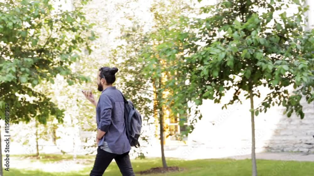 man with backpack calling on smartphone in city 45 man with backpack calling on smartphone in city 45