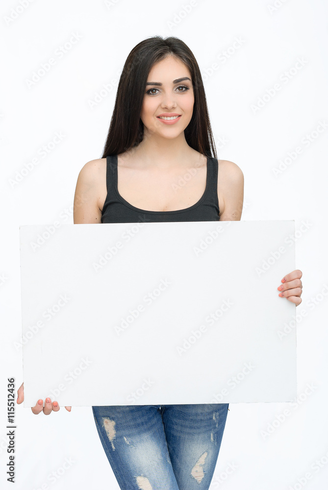 Young smiling woman show blank card or paper Young smiling woman show blank card or paper
