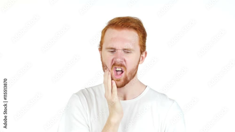 Frustrated redhair young man with a toothache , tooth pain Frustrated redhair young man with a toothache , tooth pain