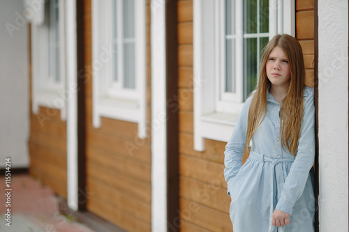 Portrait of young thinking girl