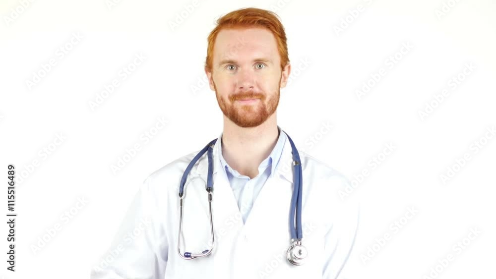 Smiling Doctor showing green apple to the camera Smiling Doctor showing green apple to the camera