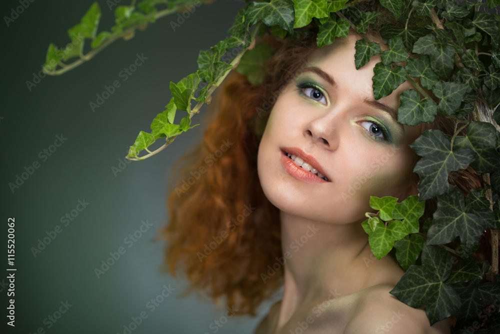 girl wearing a wreath of ivy leaves