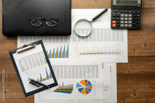 Financial printed paper charts, graphs and diagrams