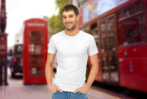Canvas Print man in blank white t-shirt over london city street