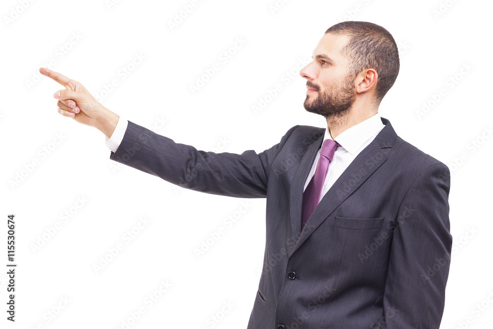 Business man pointing at copyspace, isolated on white background Business man pointing at copyspace, isolated on white background