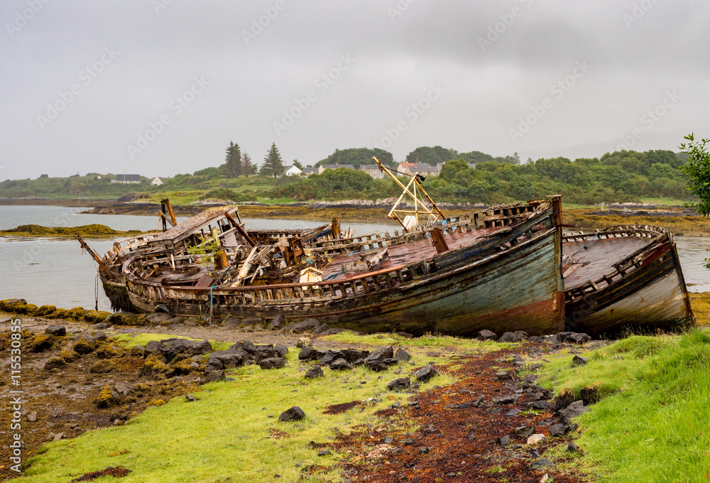 The old wooden boats at Salen Pier, Isle of Mull, Scotland, UK