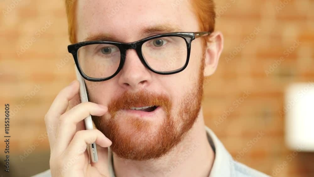Talking on Phone, Face Close-up of Young Man Talking on Phone, Face Close-up of Young Man