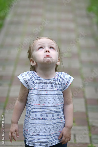 Sad little girl with a protruding lip