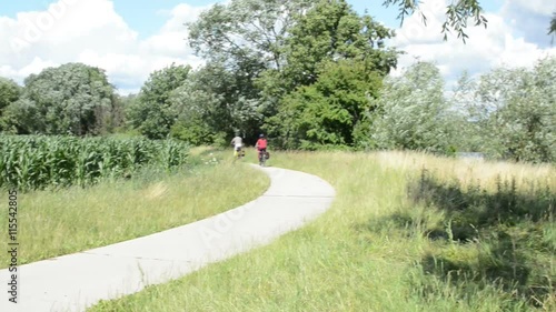 Couple cycling along the havel river bike path (Brandenburg Germany). Havelradweg. photo