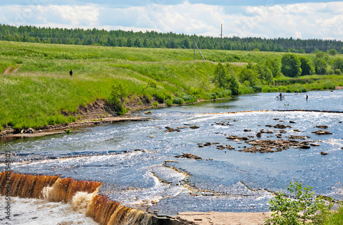 Summer landscape with river and waterfall in Leningrad Oblast. Russia photo