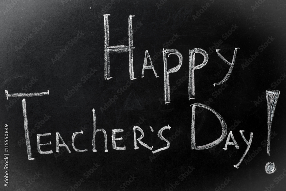 Obraz premium chalk inscription, happy teacher's day on black Board