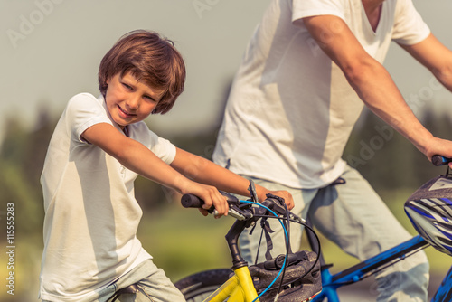 Dad and son cycling