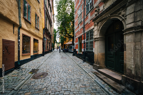 A narrow street in Galma Stan, Stockholm, Sweden. © jonbilous
