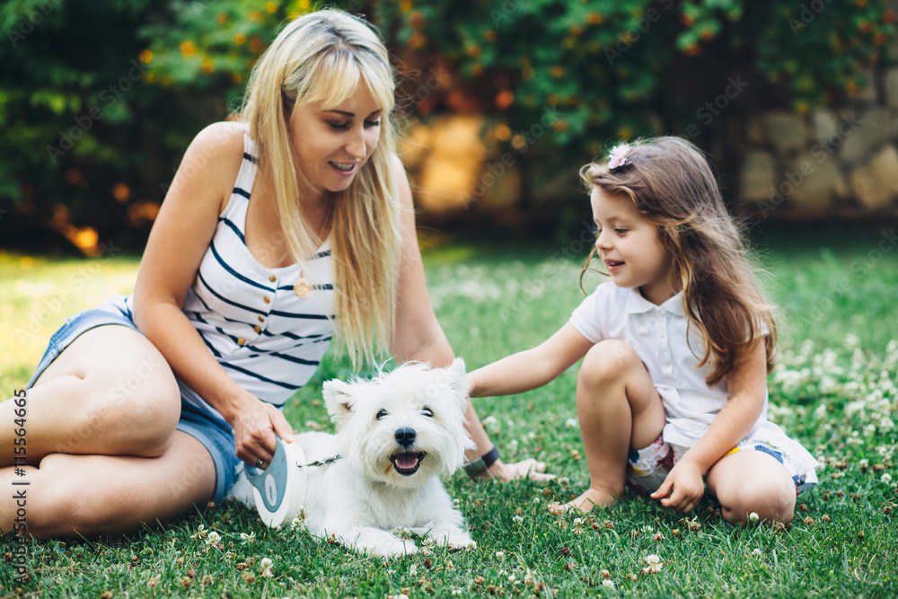 Family resting with dog Family resting with dog