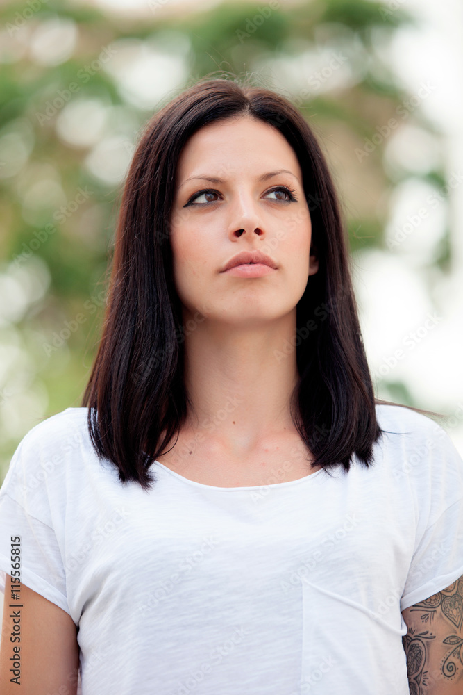 Fototapeta premium Young beautiful woman with brunette hair